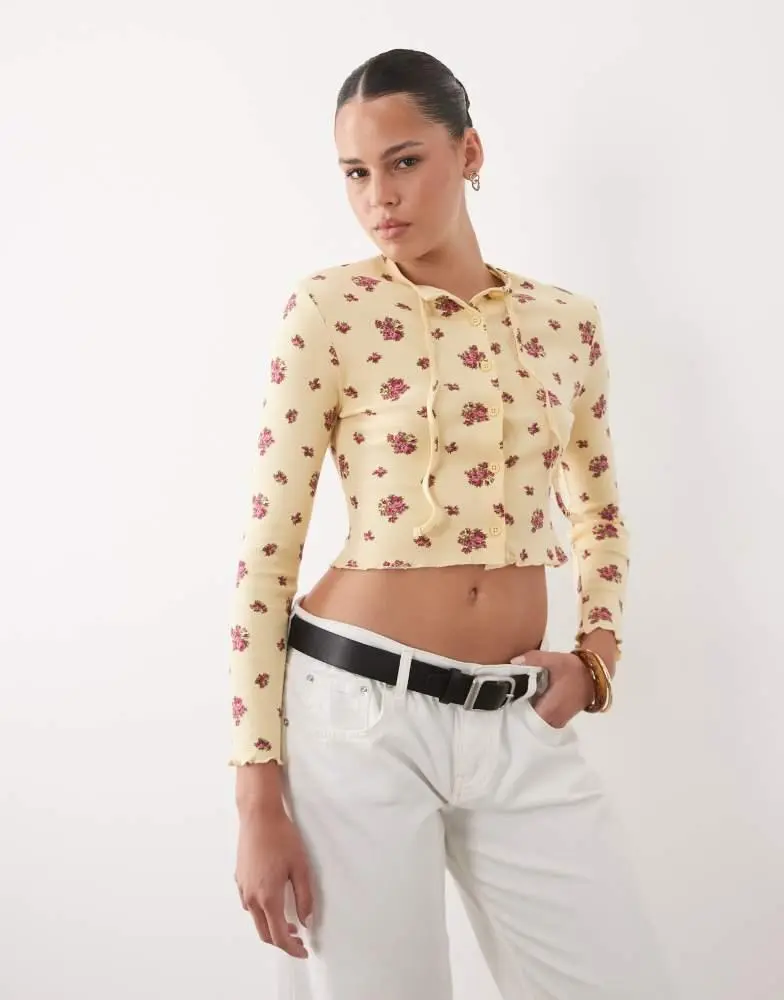 Miss Selfridge Miss Selfridge cropped cardigan with bow detail in yellow ditsy floral print