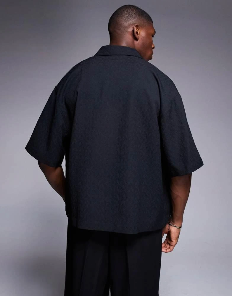 ASOS ASOS DESIGN boxy oversized textured shirt with press studs in black 4