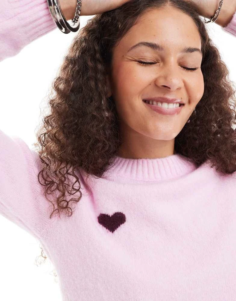 Monki Monki knitted raglan sleeve sweater in pink with burgundy contrast jacquard heart and stripe 3