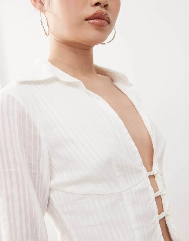 Princess Polly Princess Polly 90s textured stripe flare sleeve plunge collared shirt in white 3