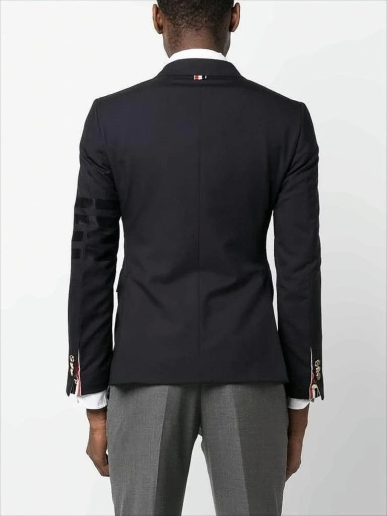 Thom Browne Sleek Tailored Suit Jacket with Notch Lapel and Metallic Buttons 4