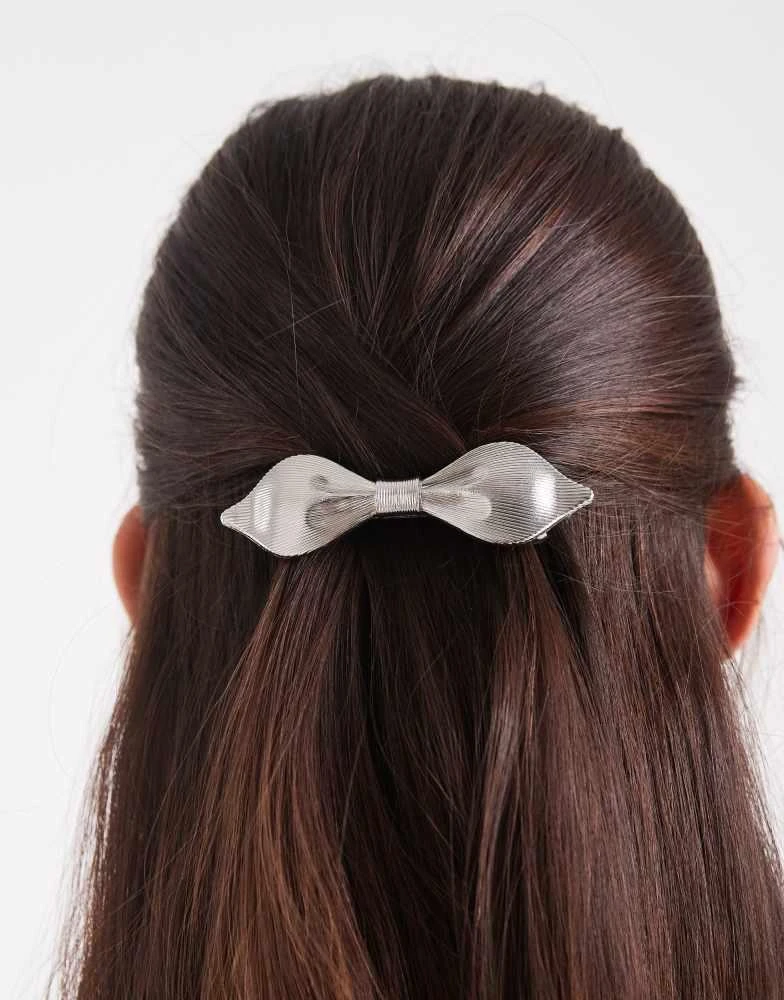 ASOS ASOS DESIGN abstract hair bow barrette clip in silver tone from ASOS