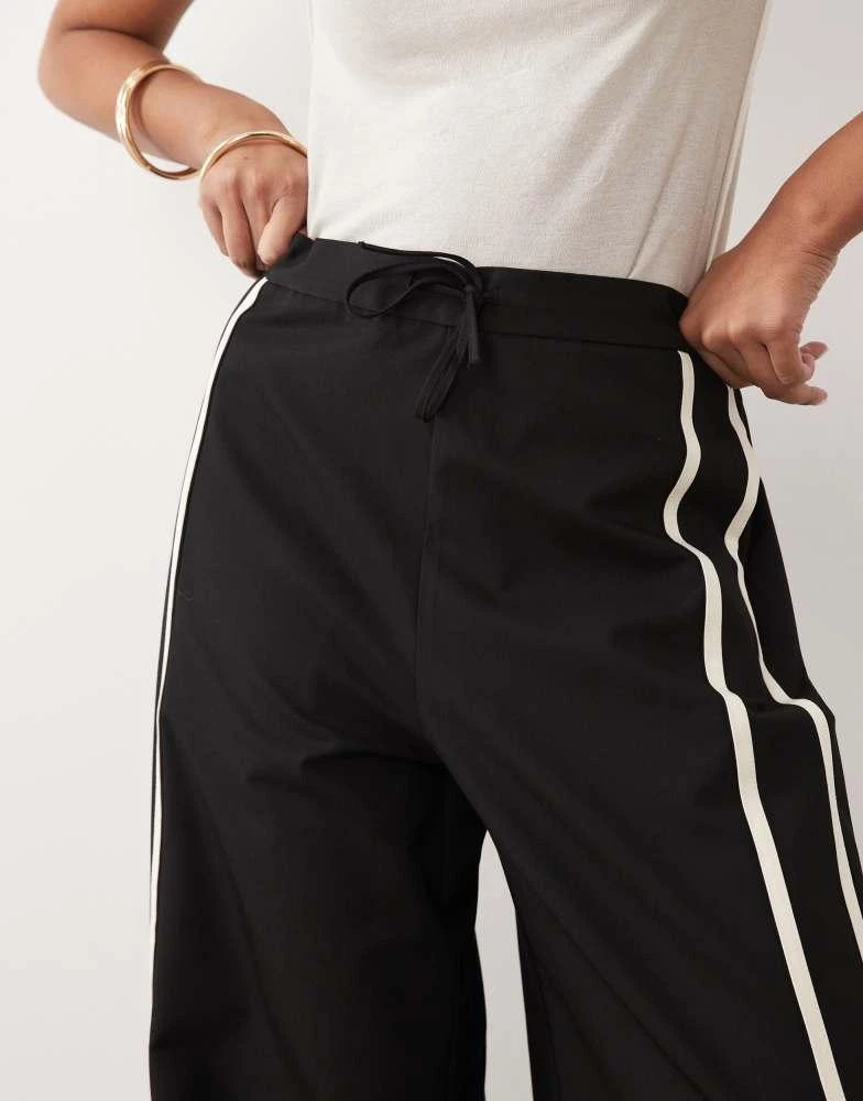 Mango Mango tie waist straight trouser with side stripe in black 4