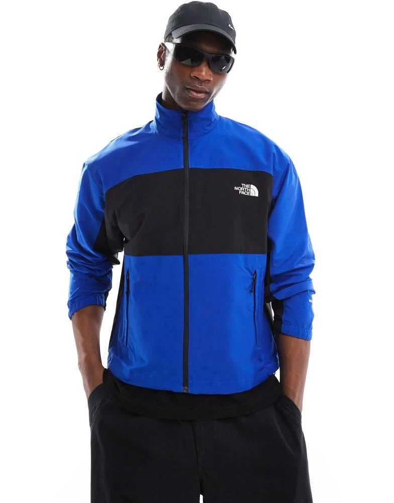 The North Face The North Face Easy Wind zip colourblock jacket in blue 1