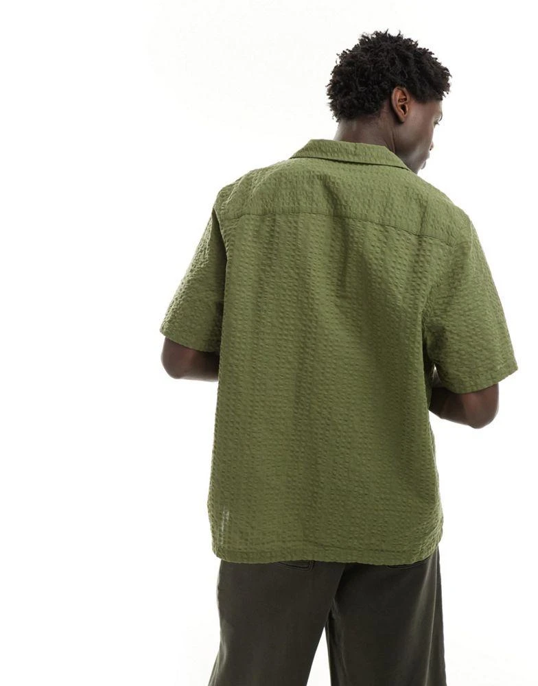 ASOS ASOS DESIGN 90s oversized short sleeve shirt in seersucker texture in khaki green 4