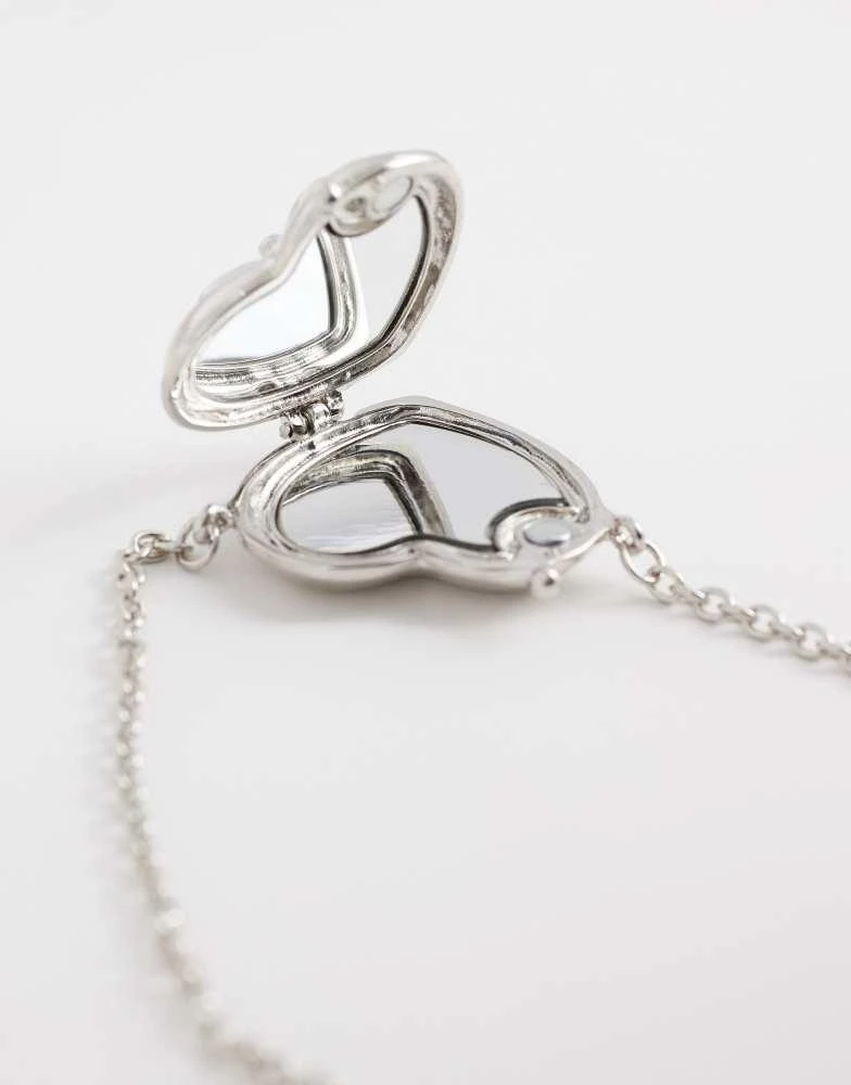 Reclaimed Vintage Reclaimed Vintage longline necklace with heart mirror locket in silver 3