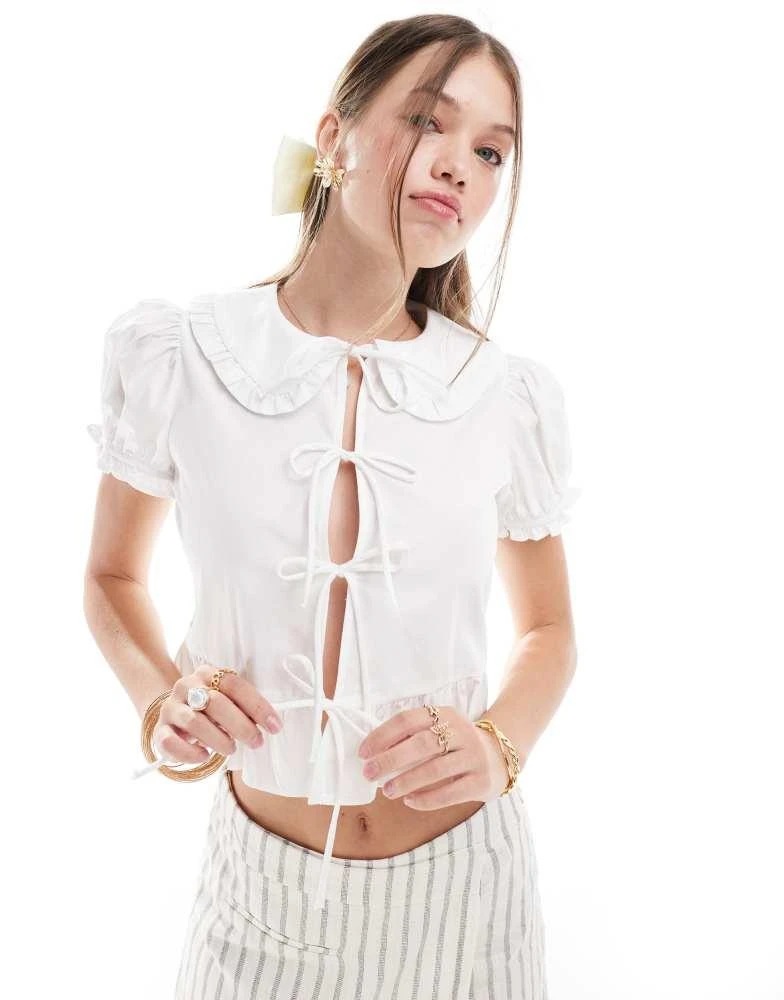 Bershka Bershka poplin peplum tie detail top in white 2