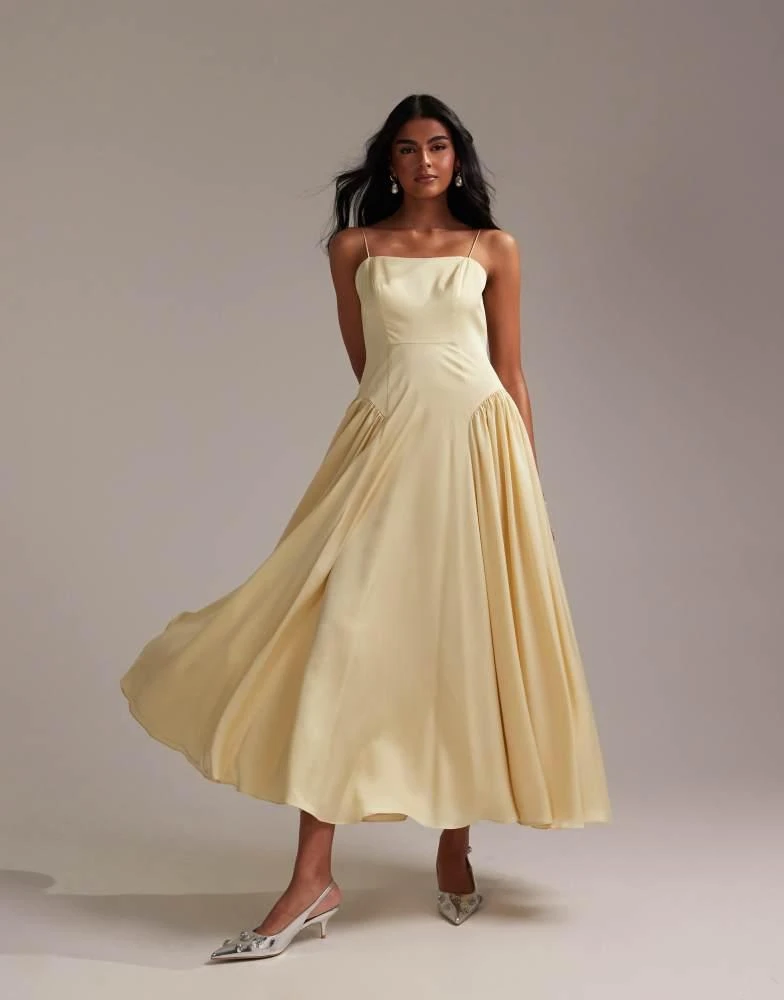 princess polly baby blue dress Shop ASOS DESIGN Bridesmaids drop waist tie detail cami midaxi dress in  soft yellow on Sale at BeyondStyle – Get 20% Off ASOS DESIGN Bridesmaids  drop waist tie detail cami midaxi dress