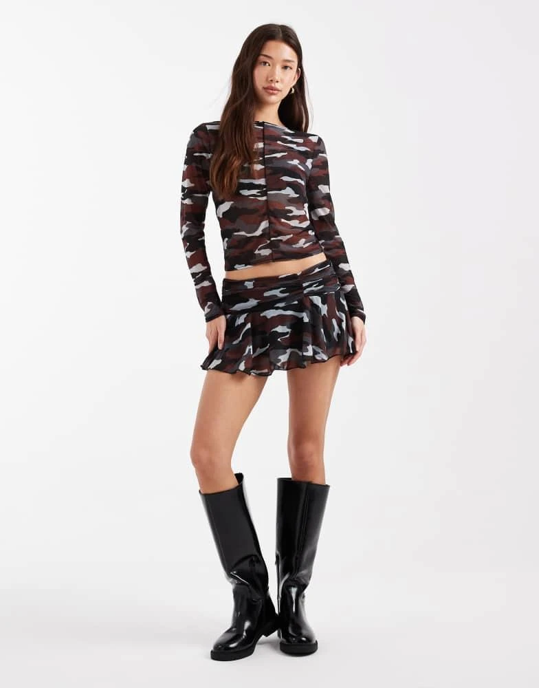 Shop COLLUSION flippy micro mini skirt in red camo on Sale at