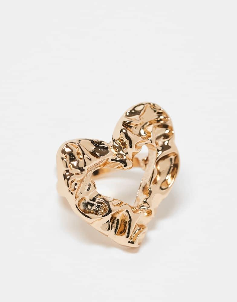 ASOS ASOS DESIGN ring with oversized molten heart design in gold tone