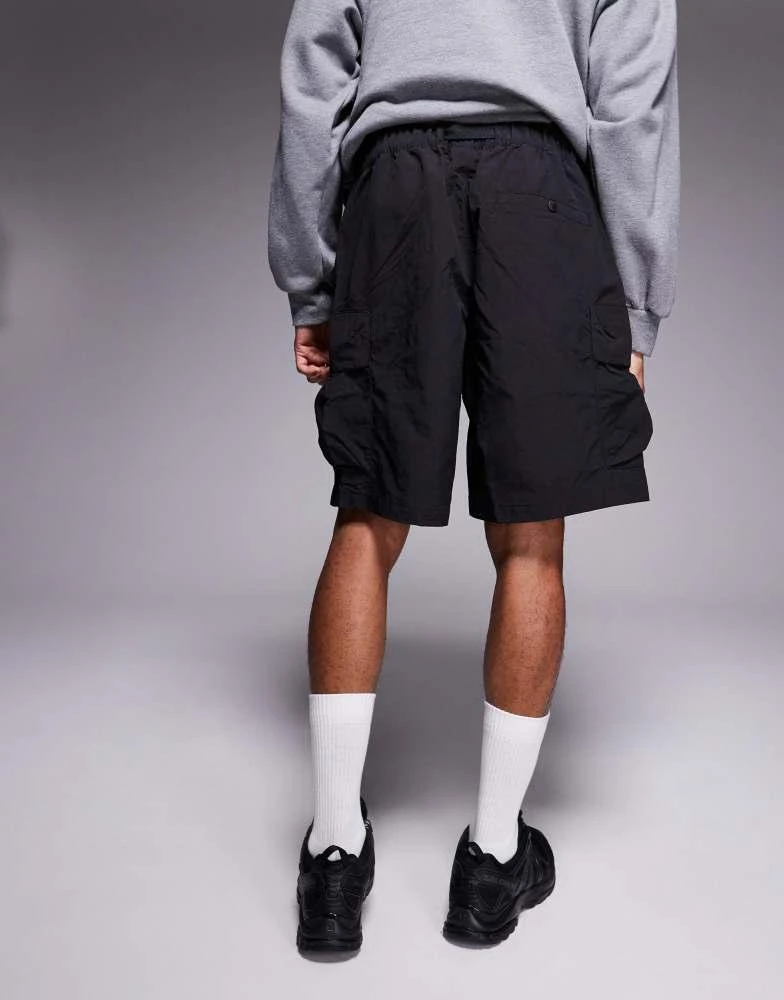 The North Face The North Face cargo pocket logo shorts in black 2