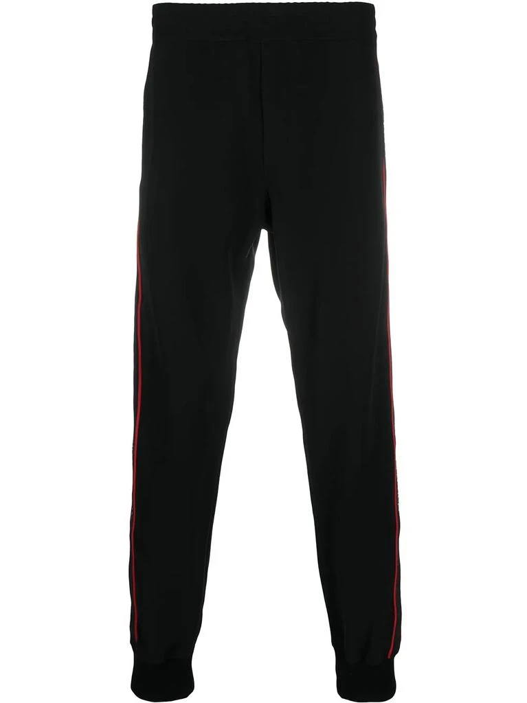Alexander McQueen logo tape track trousers - men 1