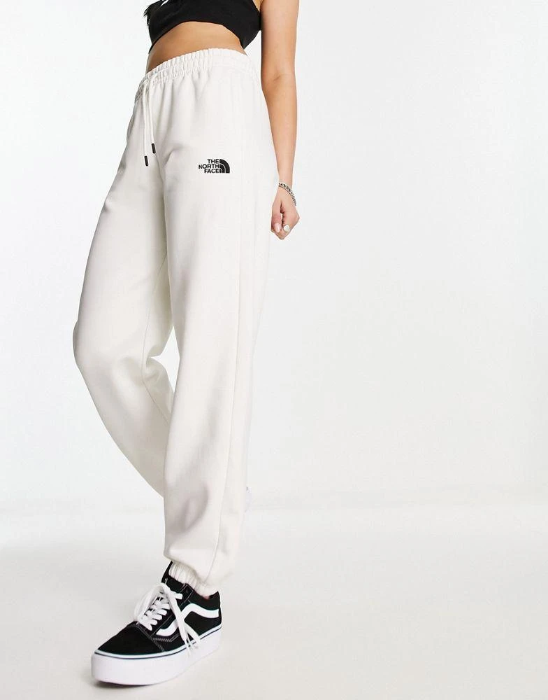 The North Face The North Face Essential oversized joggers in cream Exclusive at ASOS 3