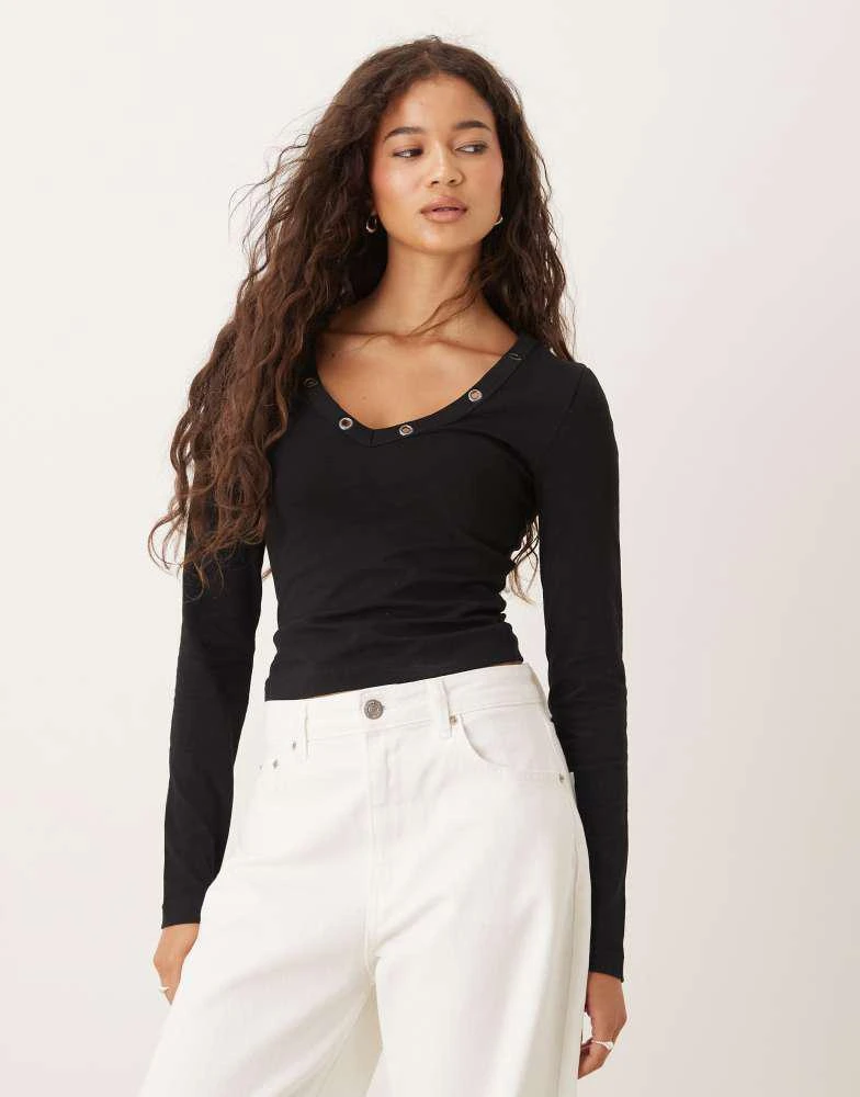 ASOS ASOS DESIGN v neck rib long sleeve top with ring stud detail