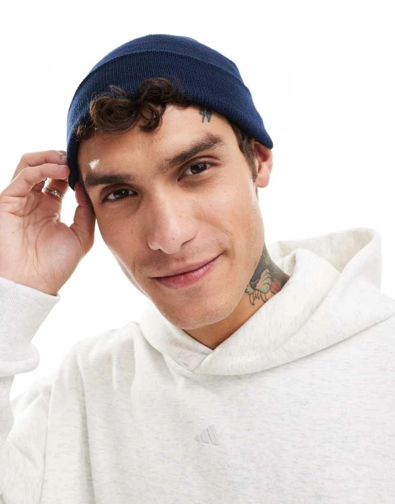ASOS ASOS DESIGN mini fisherman ribbed beanie in navy 3