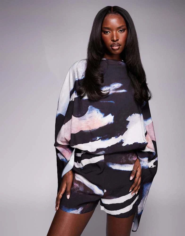 ASOS ASOS DESIGN batwing overlay playsuit in abstract print 4