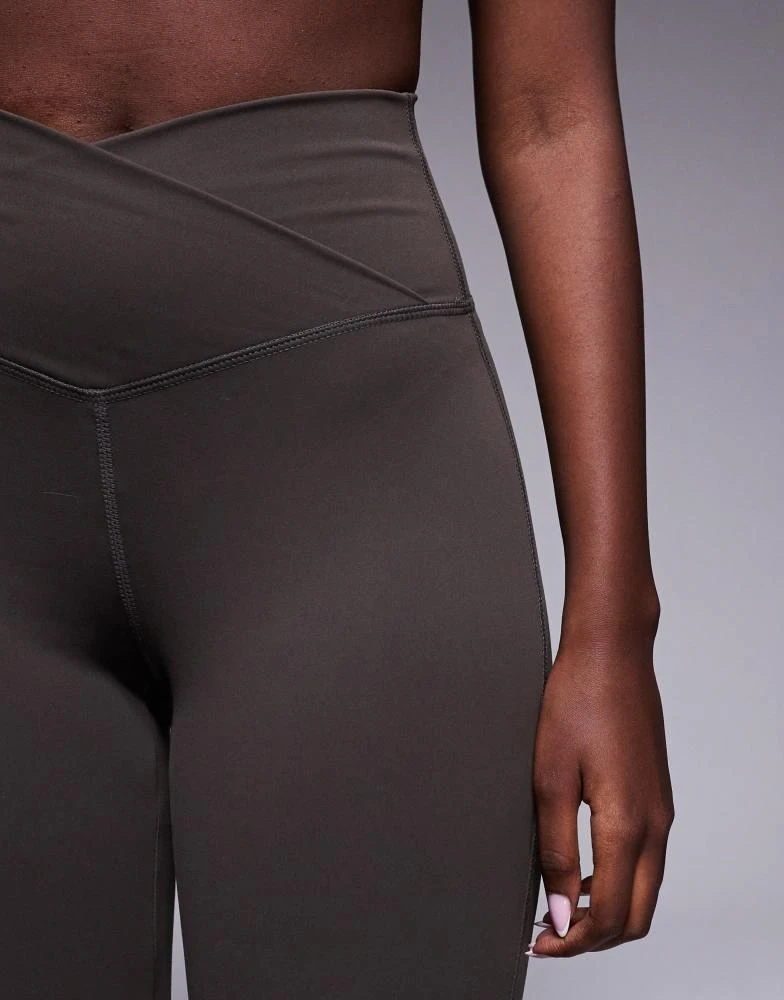 The Couture Club The Couture Club sculpting stretch emblem flare leggings in chocolate 4