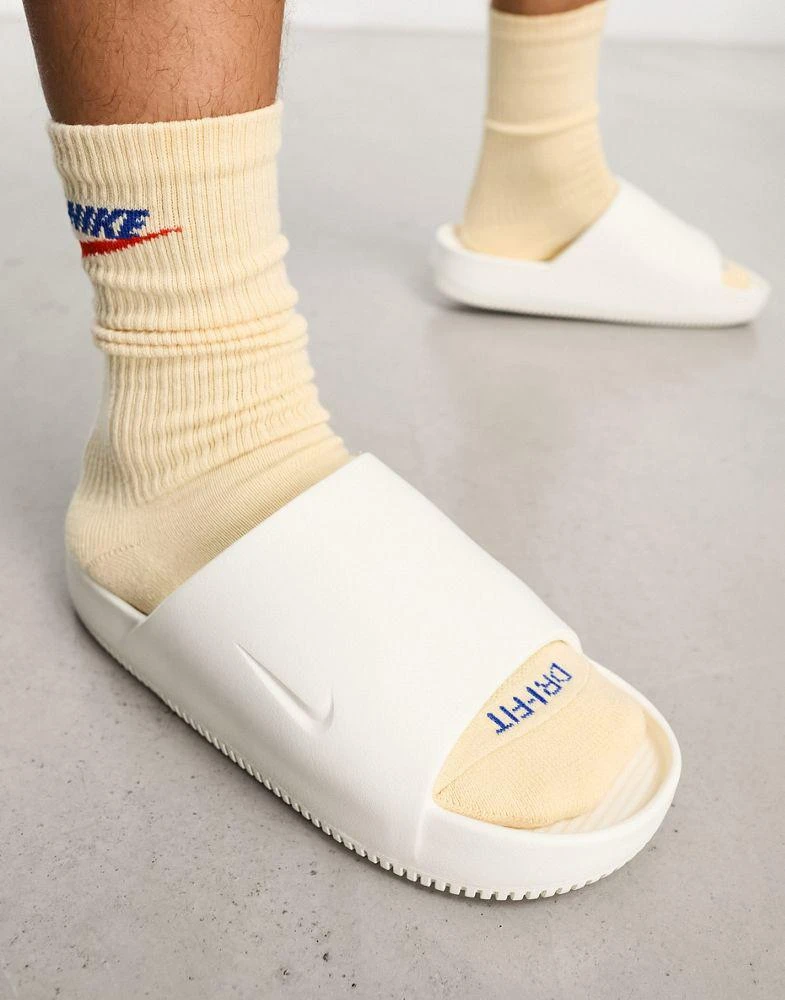 NIKE Nike Calm sliders in white 1