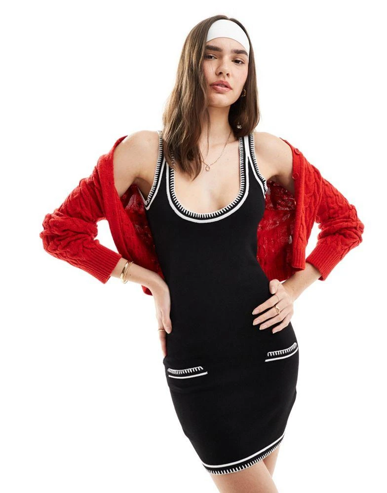 SNDYS knit scoop back detail mini dress with pocket detail in black with white stitch On Sale Now with Up to 40% Off | Discover Exclusive Deals & Savings at BeyondStyle SNDYS knit scoop back detail mini dress with pocket detail in black with white stitch On Sale Now with Up to 40% Off | Discover Exclusive Deals & Savings at BeyondStyle