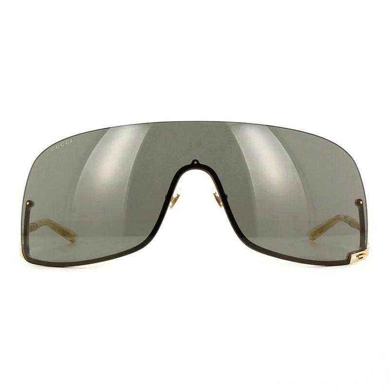 Gucci Gucci Shield Semi Rim, with a Gold frame and Grey lens.