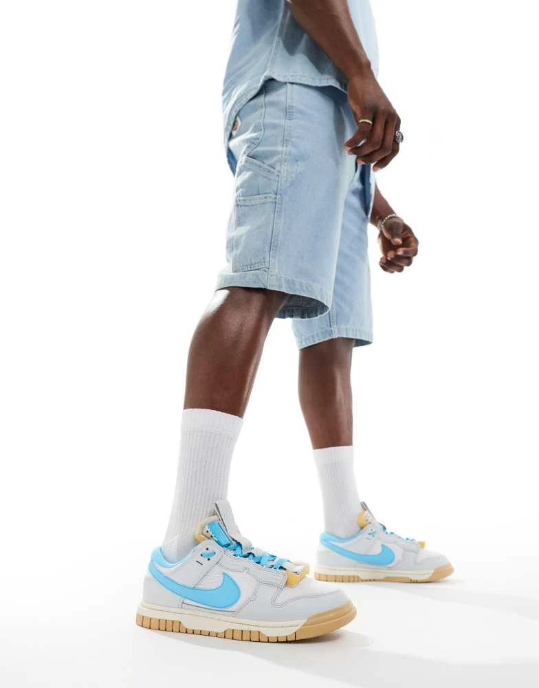NIKE Nike Dunk Low jumbo trainers in white and blue 5
