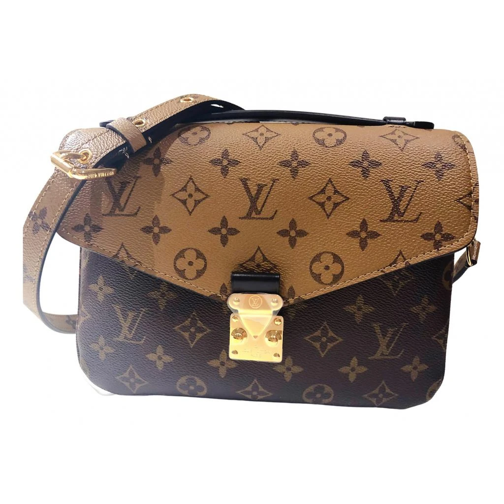 Louis Vuitton Louis Vuitton Metis cloth crossbody bag 1