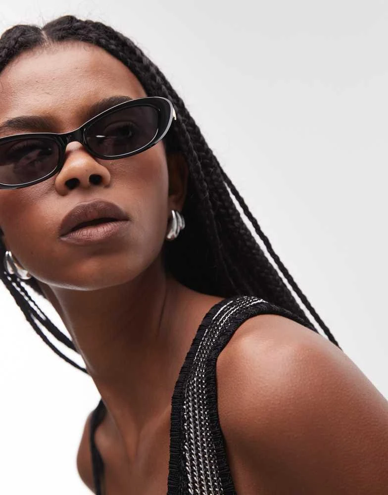 Shop Le Specs the whisperer oval sunglasses in black on Sale at