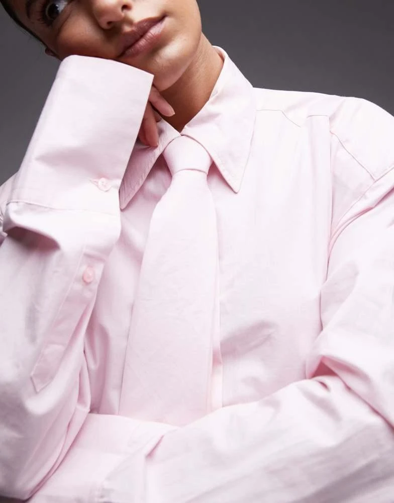ASOS ASOS DESIGN cinch waist shirt with shoulder pads and tie in pink 2