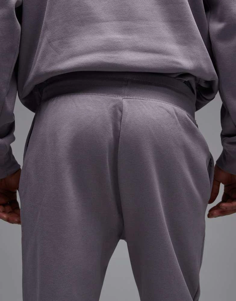 The North Face The North Face Essential logo oversized joggers in grey 5
