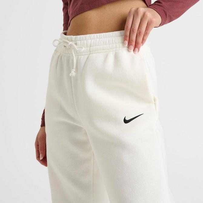 women's nsw open hem fleece pant varsity