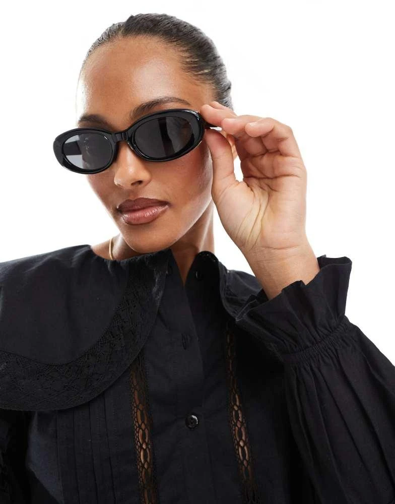 ASOS ASOS DESIGN oval sunglasses in shiny black 1