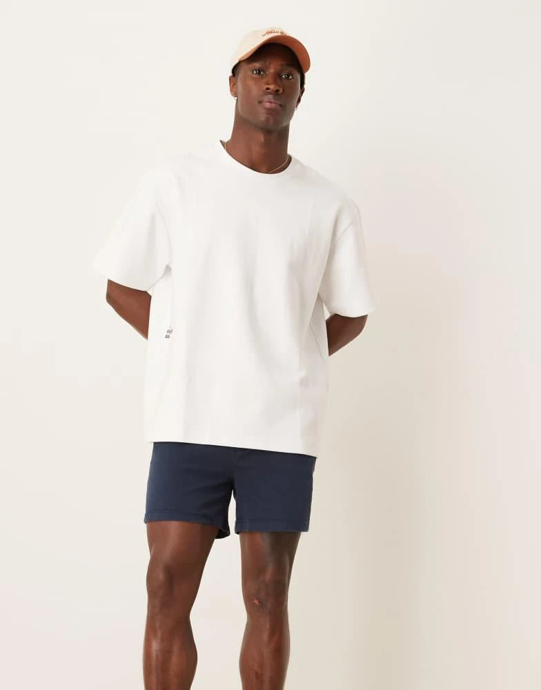 ASOS ASOS DESIGN shorter length skinny chino shorts in navy 1