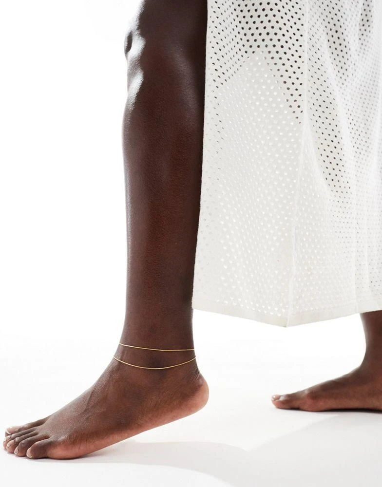 ASOS ASOS DESIGN Curve waterproof stainless steel anklet with multirow fine snake chain design in gold tone 3