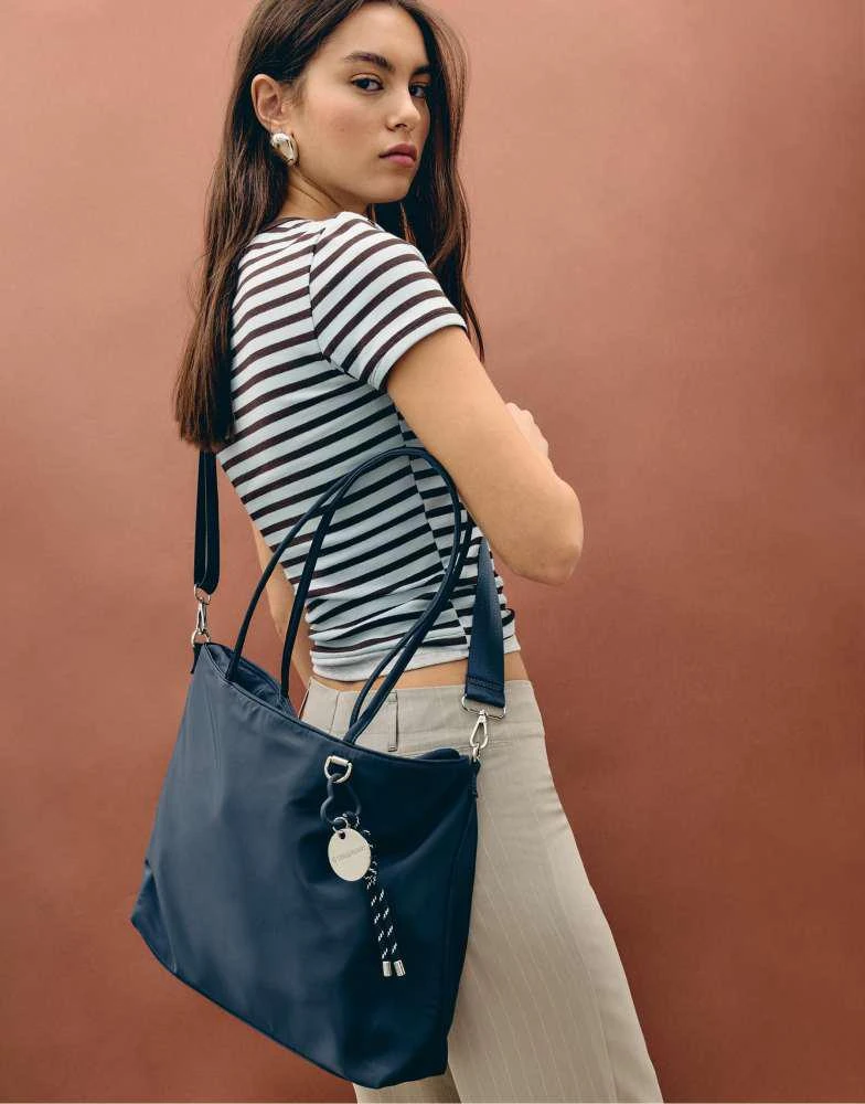 Stradivarius Stradivarius Fabric shopper bag with charm in navy blue 3