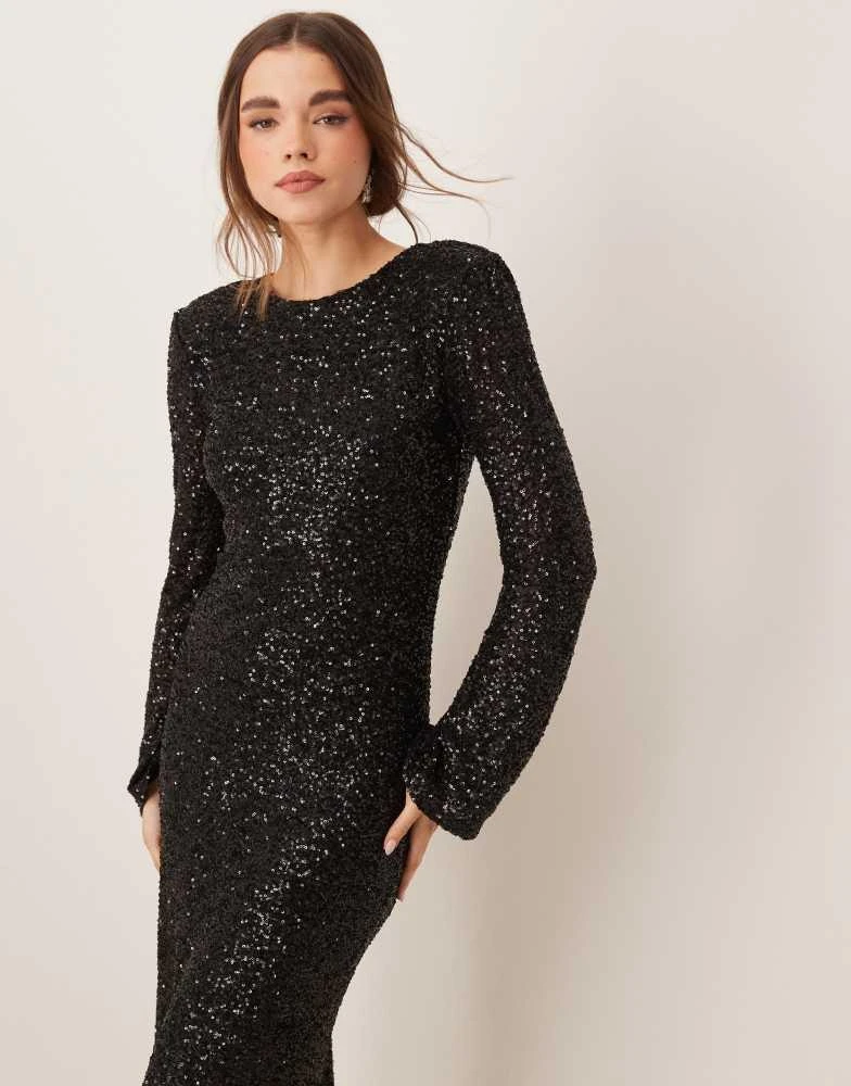 Shop Gina Tricot fluted sleeve sequin maxi dress with open back in black on  Sale at BeyondStyle  Get 6% Off Gina Tricot fluted sleeve sequin maxi dress  with open back in