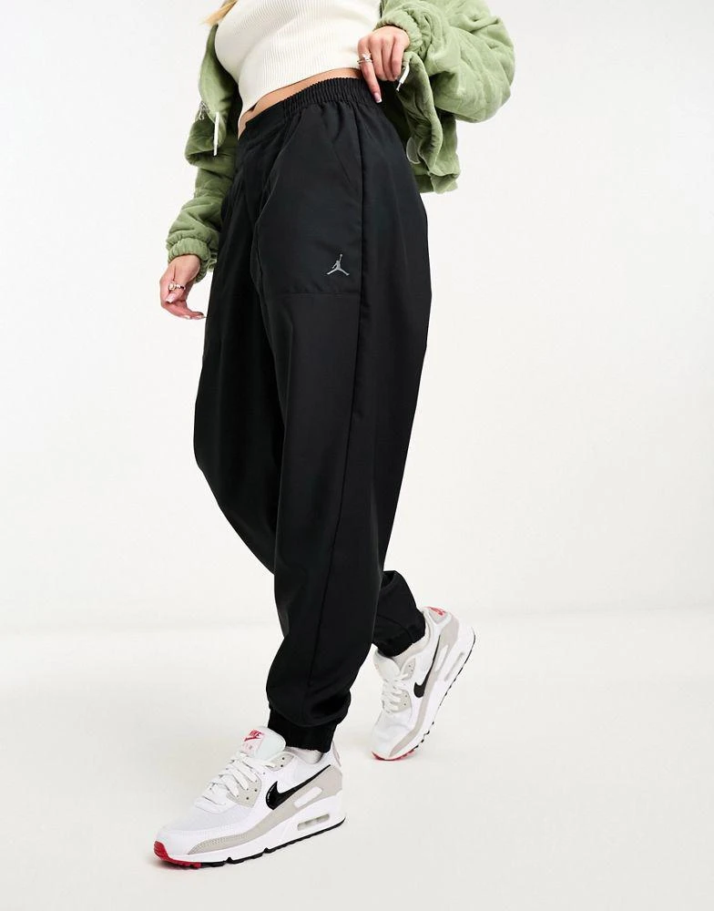 Jordan Jordan core woven track joggers in black 1