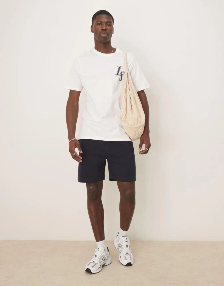 ASOS ASOS DESIGN essential mid length slim shorts in navy 1