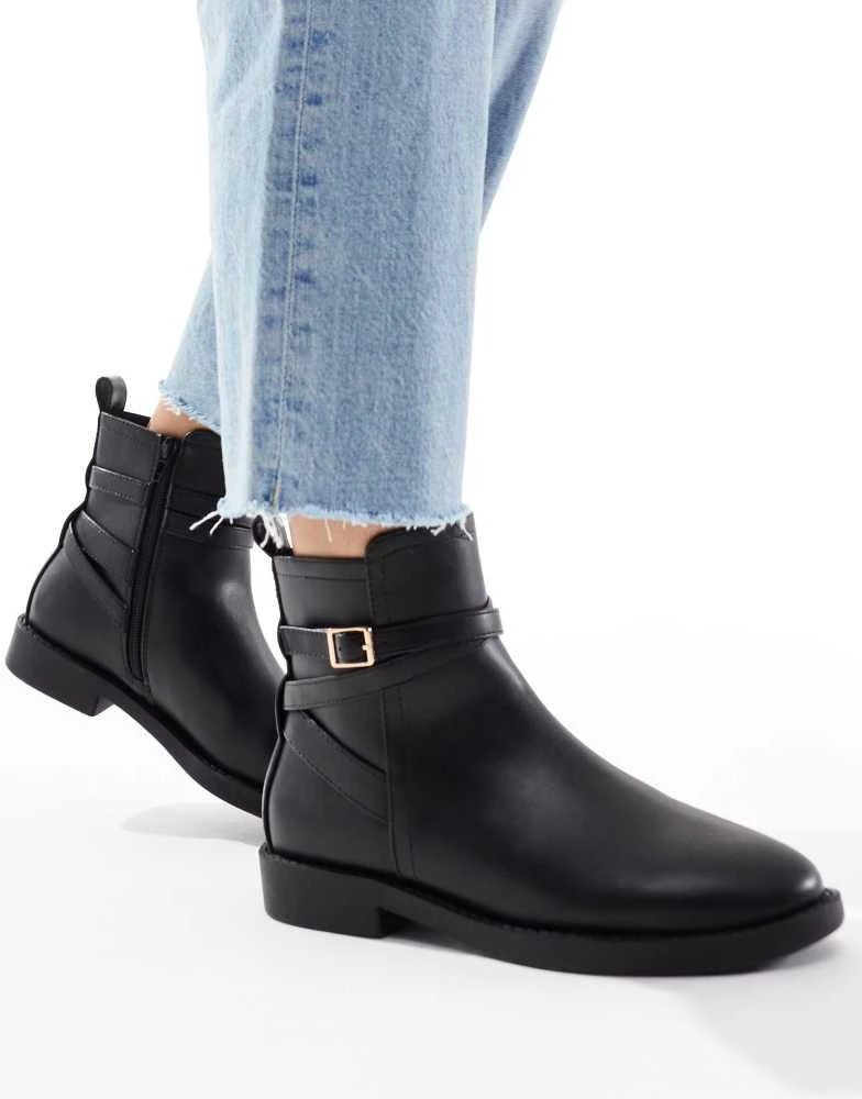 ASOS ASOS DESIGN Wide Fit Aria flat chelsea boots with buckle detail in black 4