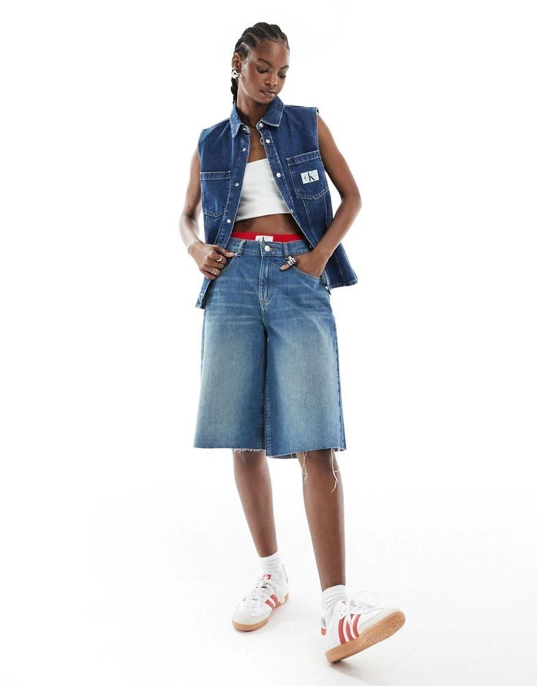 Calvin Klein Calvin Klein Jeans sleeveless lean denim shirt in mid wash 3