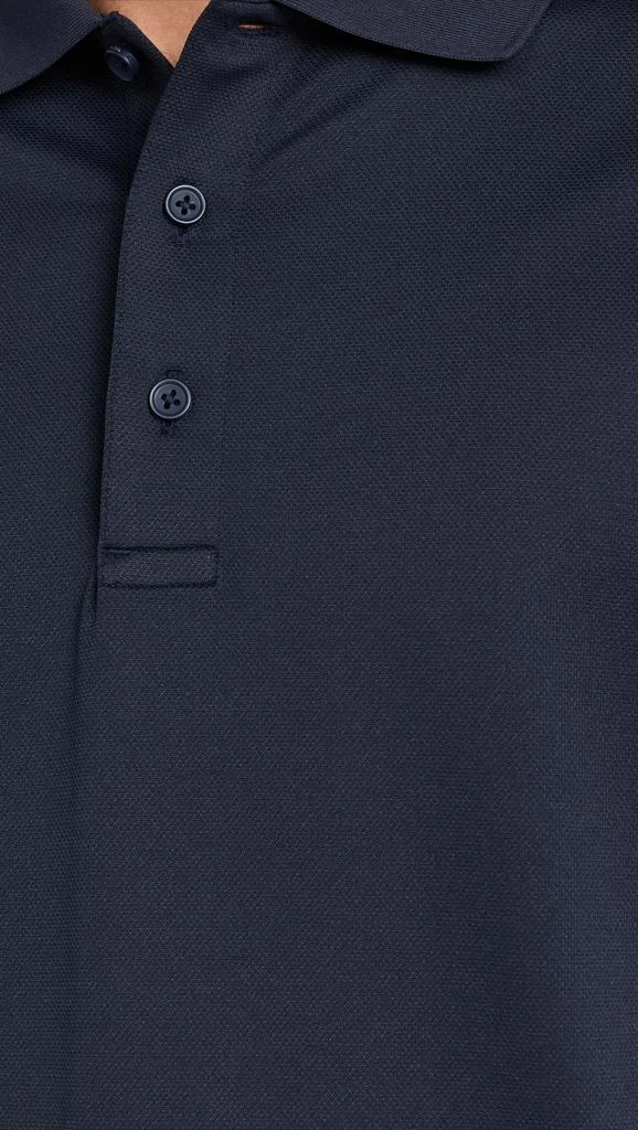 REIGNING CHAMP Tech Pique Playoff Polo 5