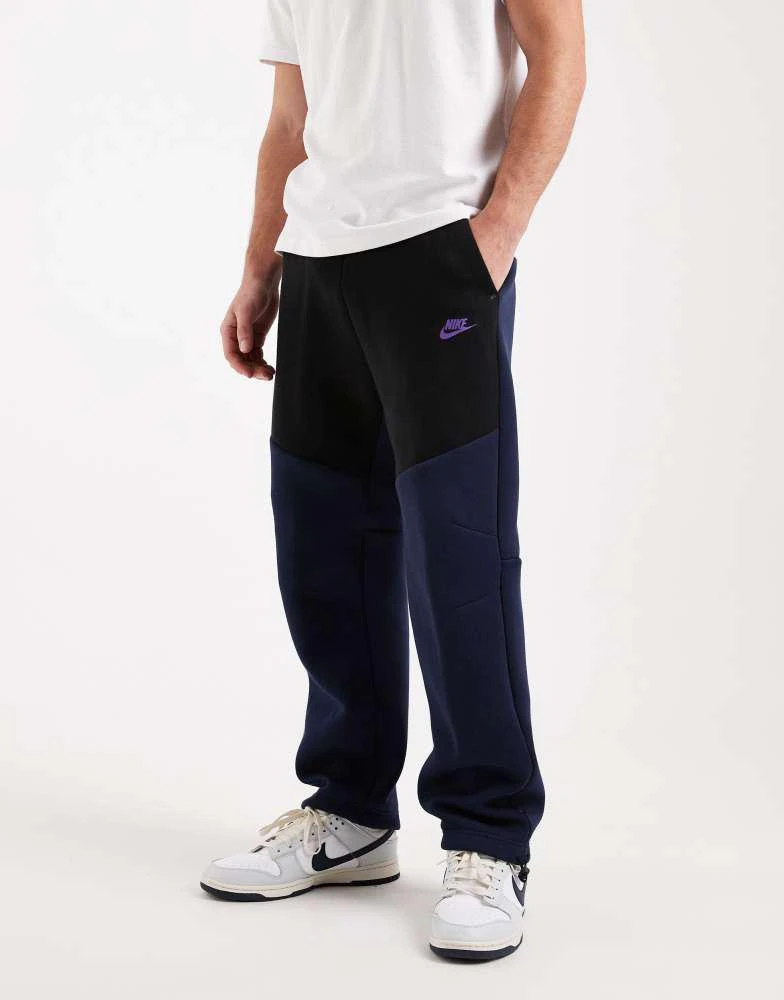 NIKE Nike Tech Fleece open hem joggers in black and navy