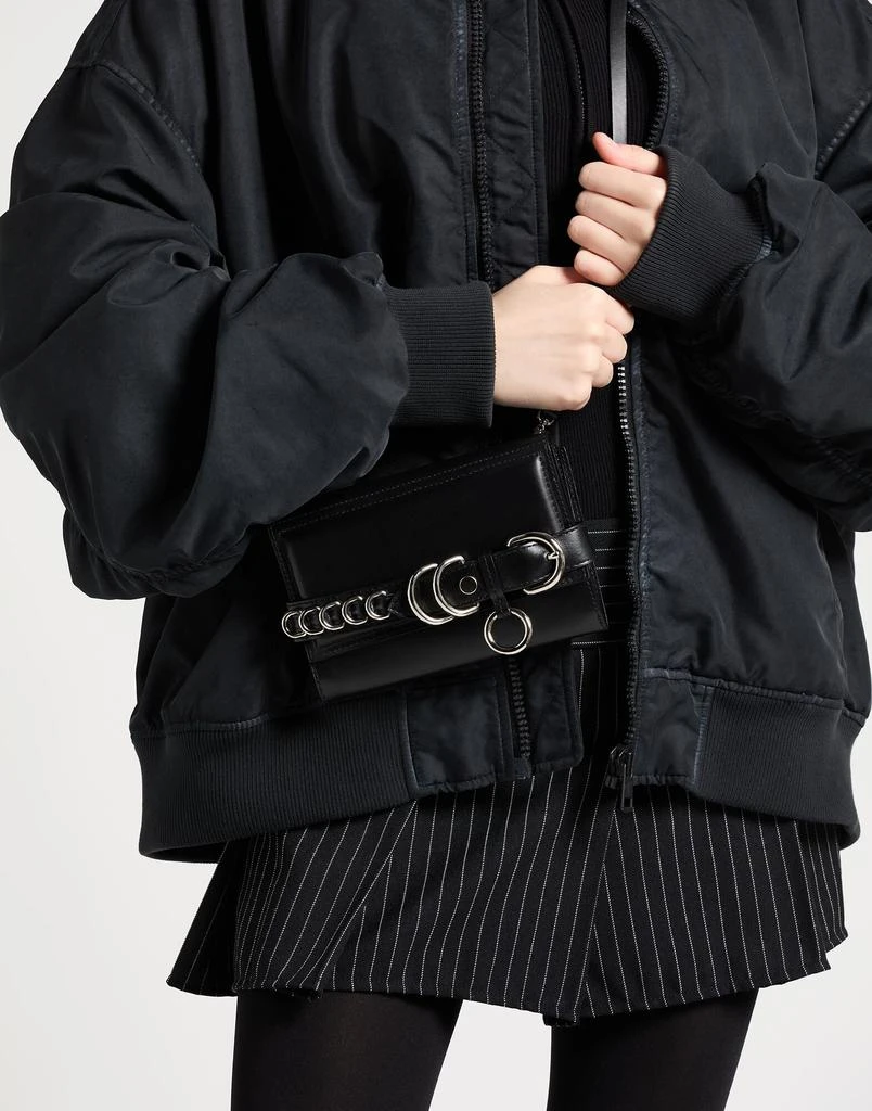 Cedric Charlier Cross-body bags 3