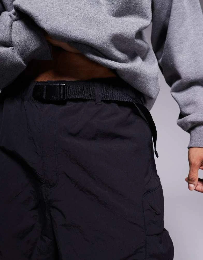 The North Face The North Face cargo pocket logo shorts in black 4