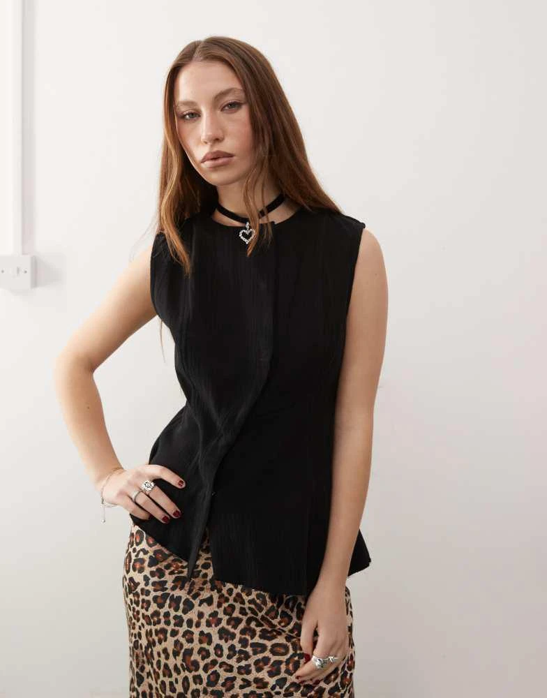 Weekday Weekday Ibis asymmetric peplum top with concealed buttons in black 1