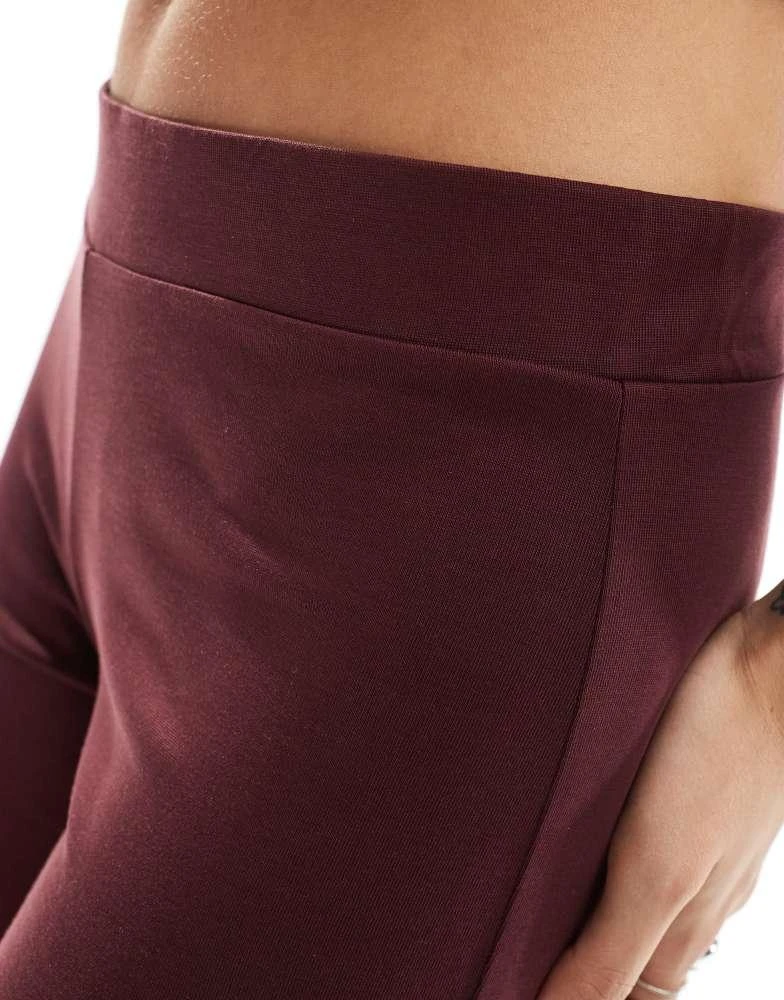 Monki Monki super soft low waist straight leg baggy jersey trousers in burgundy 4