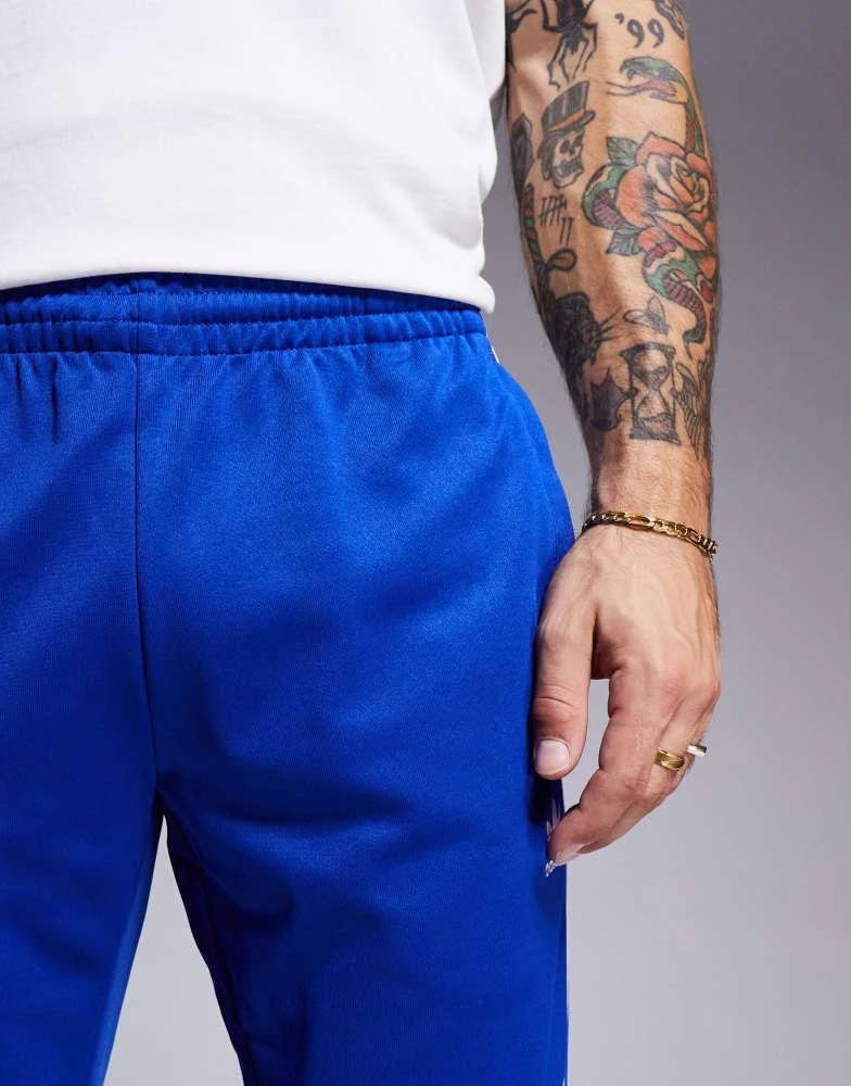 Adidas adidas Originals skinny jogger in blue 4