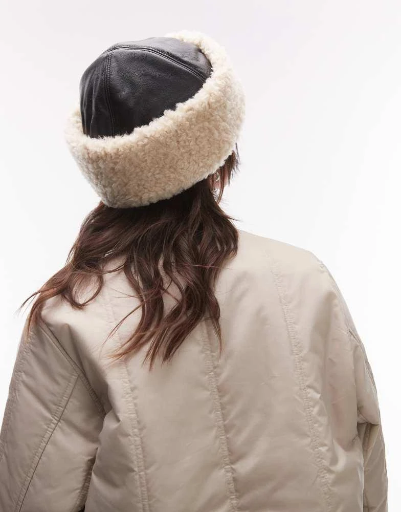 ARKET ARKET premium leather hat with faux shearling fold over lining in black and cream 2