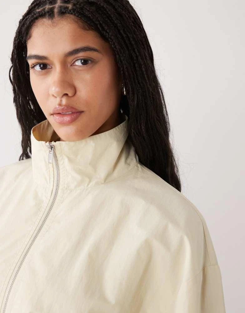 Weekday Weekday track jacket with funnel collar in light beige 2