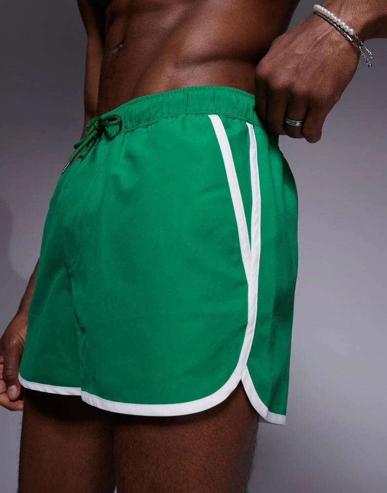 ASOS ASOS DESIGN runner swim shorts in short length in bright green 1