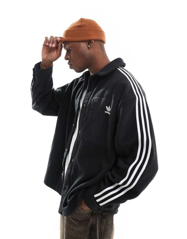 Adidas adidas Originals polar shirt in black 1